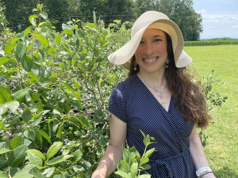 Kristy picking blueberries