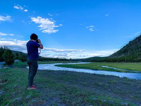 Rob taking a photo of some bison